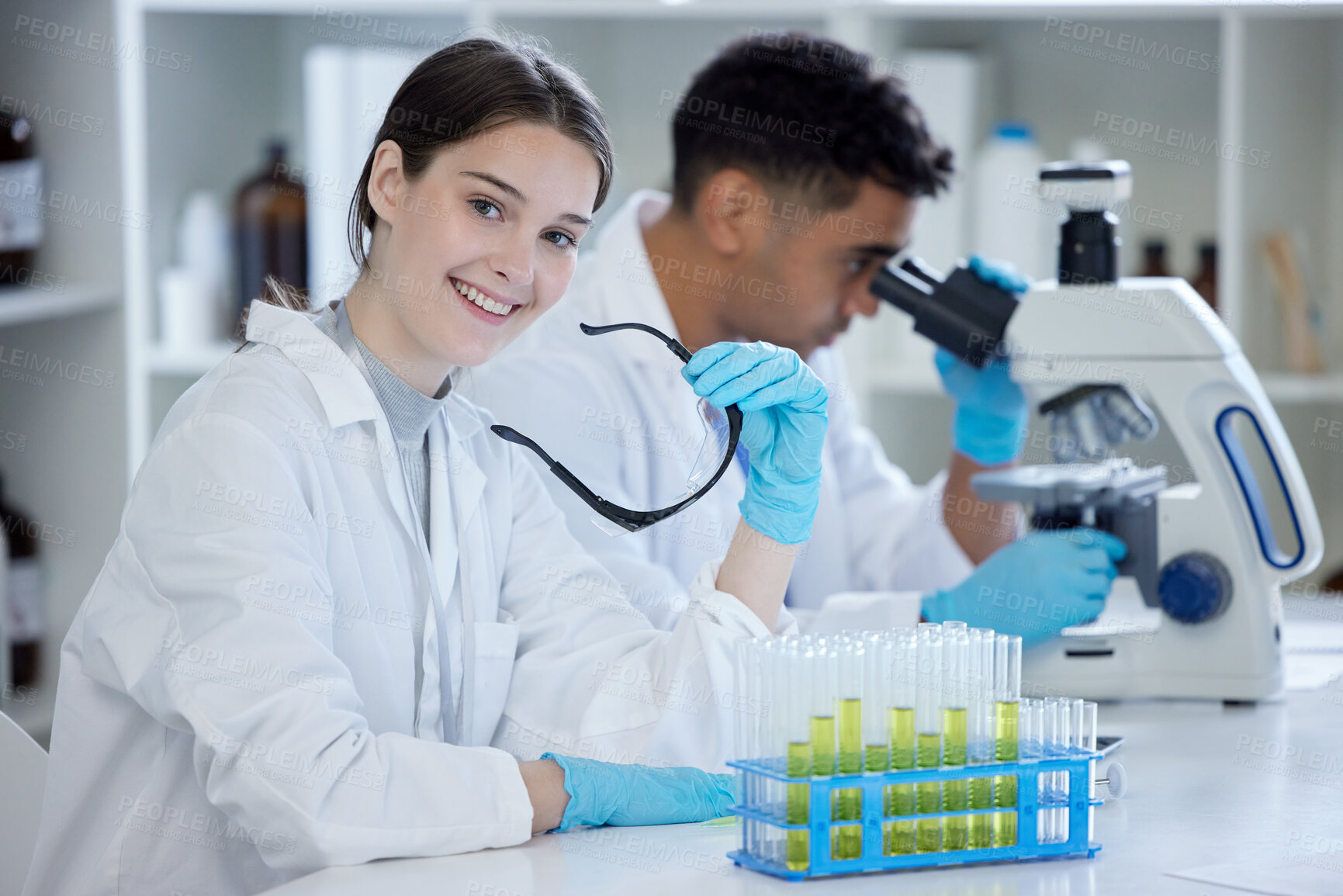 Buy stock photo Woman, student and portrait with scientist research and university lab with study. Medical, education and pathology with virus and chemistry project with tube results and college classroom with smile