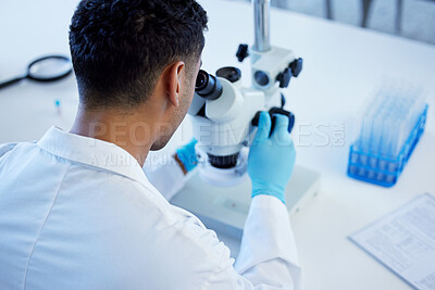 Buy stock photo Science, exam and man with microscope, notes and medical research in laboratory. Vaccine innovation, scientist or lab technician for healthcare, medicine and pharmaceutical development in test tube.