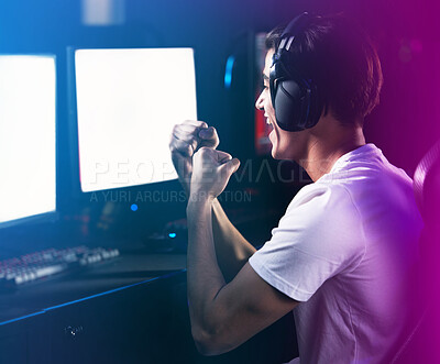 Buy stock photo Neon, man and celebration as pro gamer with computer screen for online video games and excited. Headphones, esports and happy at home with victory on contest, challenge and competition as winner