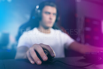 Buy stock photo Shot of a young man playing computer games