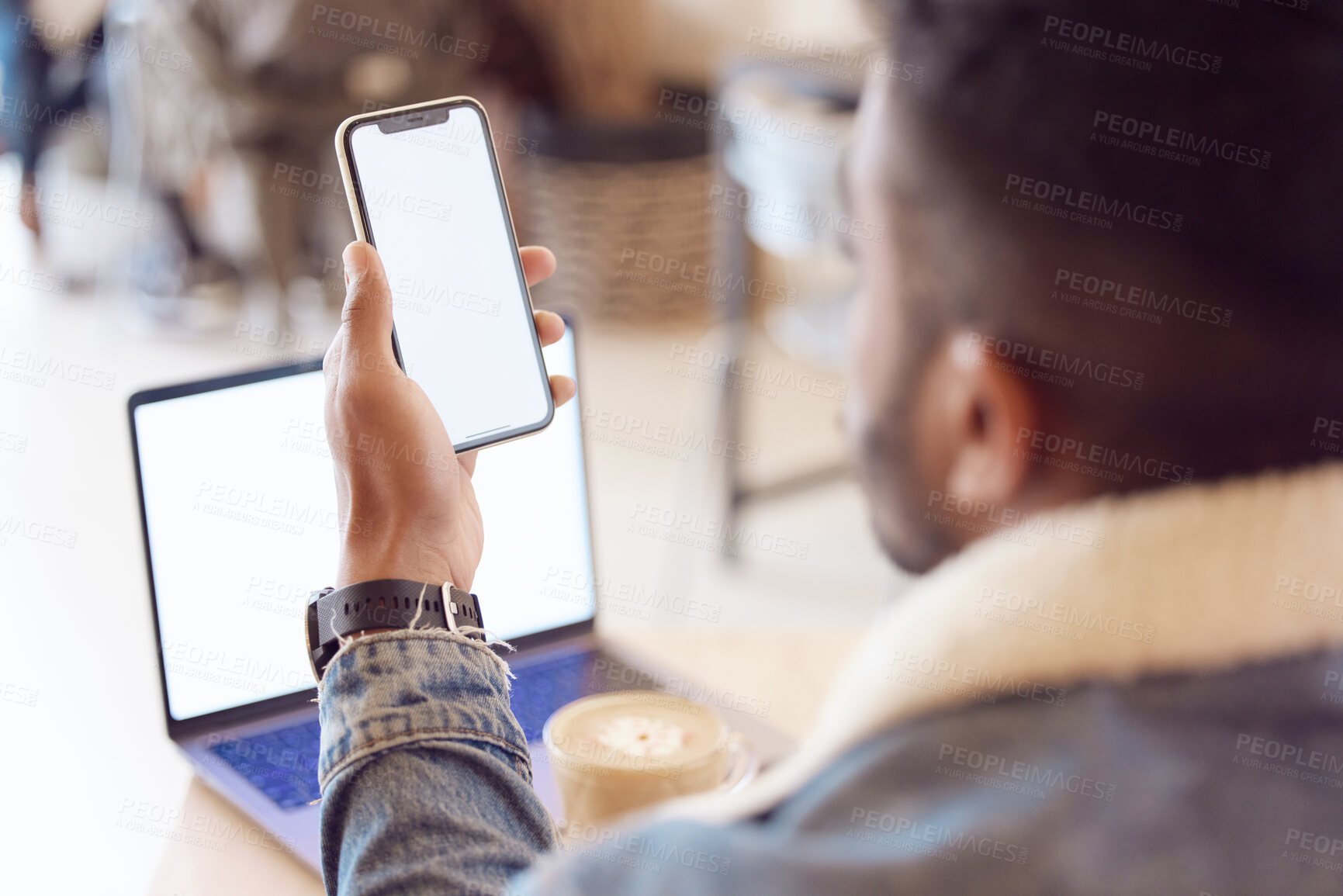 Buy stock photo Man, back and smartphone or laptop screen in coffee shop, mock up and freelancer relax with tech or mobile app. Browse, email and social media or online shopping, male person and blank communication