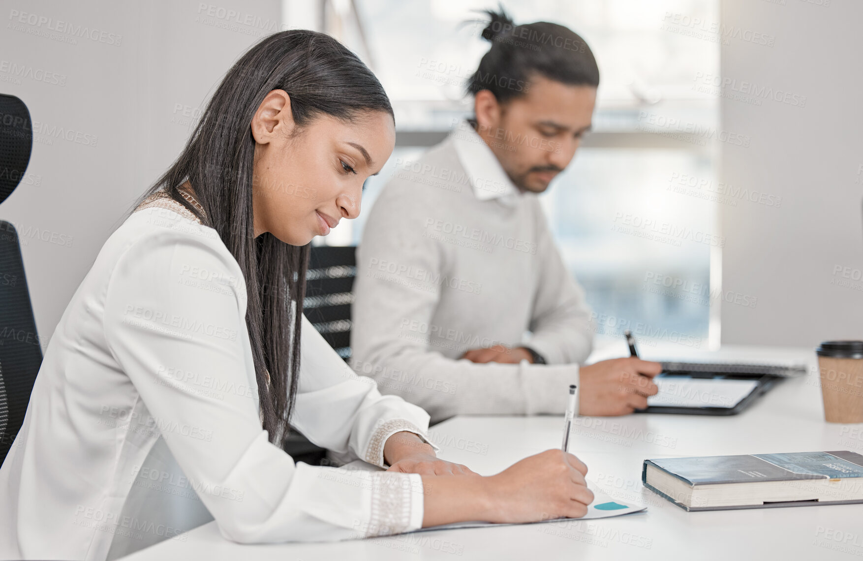 Buy stock photo Business woman, writing on notebook and laptop on table with employee, planning in office and calendar schedule. Personal assistant, event planner and person taking notes, meeting agenda and idea