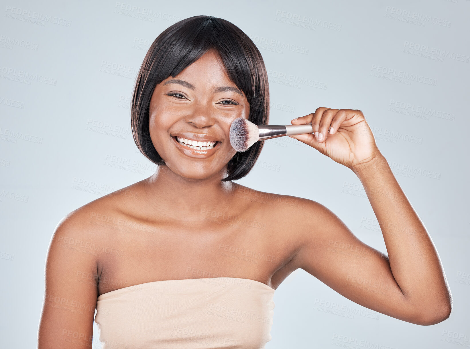 Buy stock photo Brush, makeup and portrait of black woman in studio for wellness, beauty and cosmetics on white background. Cosmetology, skincare and person with tools for spa product application, salon and blush