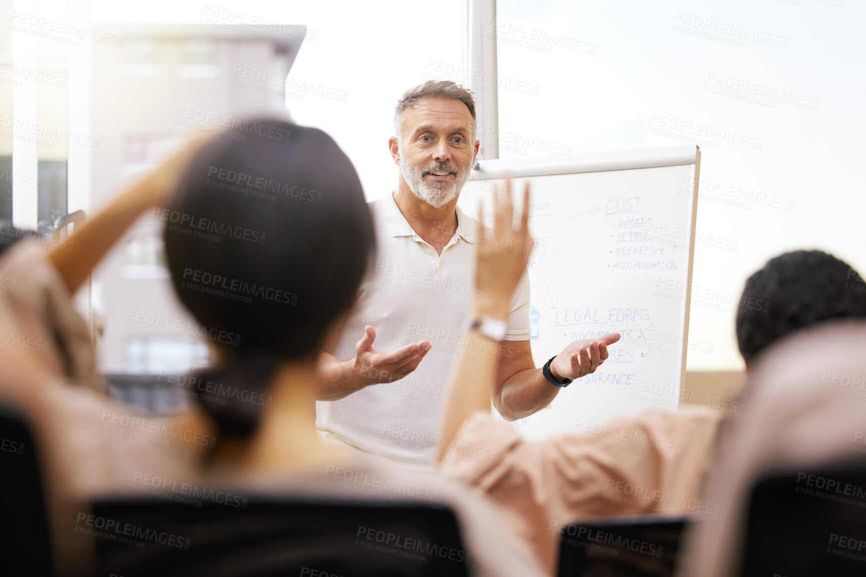 Buy stock photo Group, speaker and man in a workshop, presentation and questions for feedback, meeting and review. Male person, mentor and staff in a conference room, teamwork and sales growth with collaboration