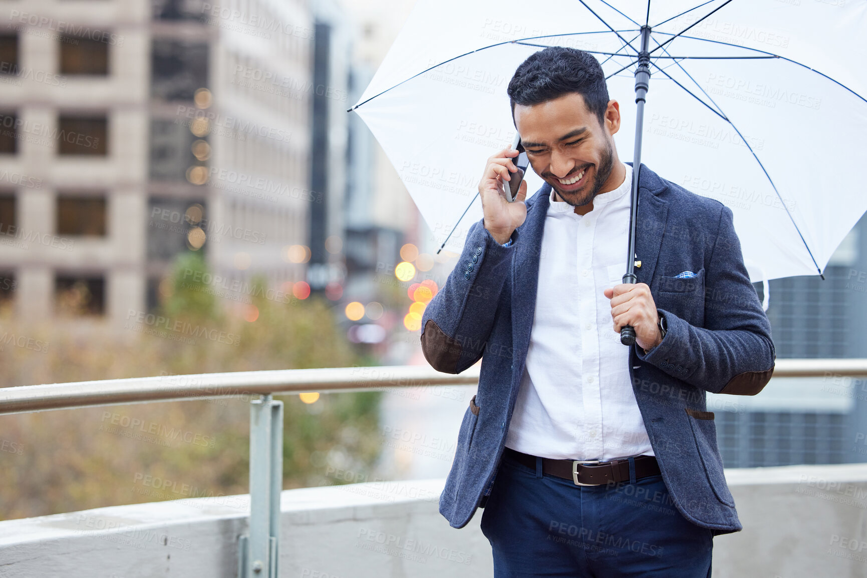 Buy stock photo Businessman, phone call and umbrella with communication in city for justice, advocate for legal with tech. Male lawyer, rain or parasol with conversation and mobile in urban, attorney in New York