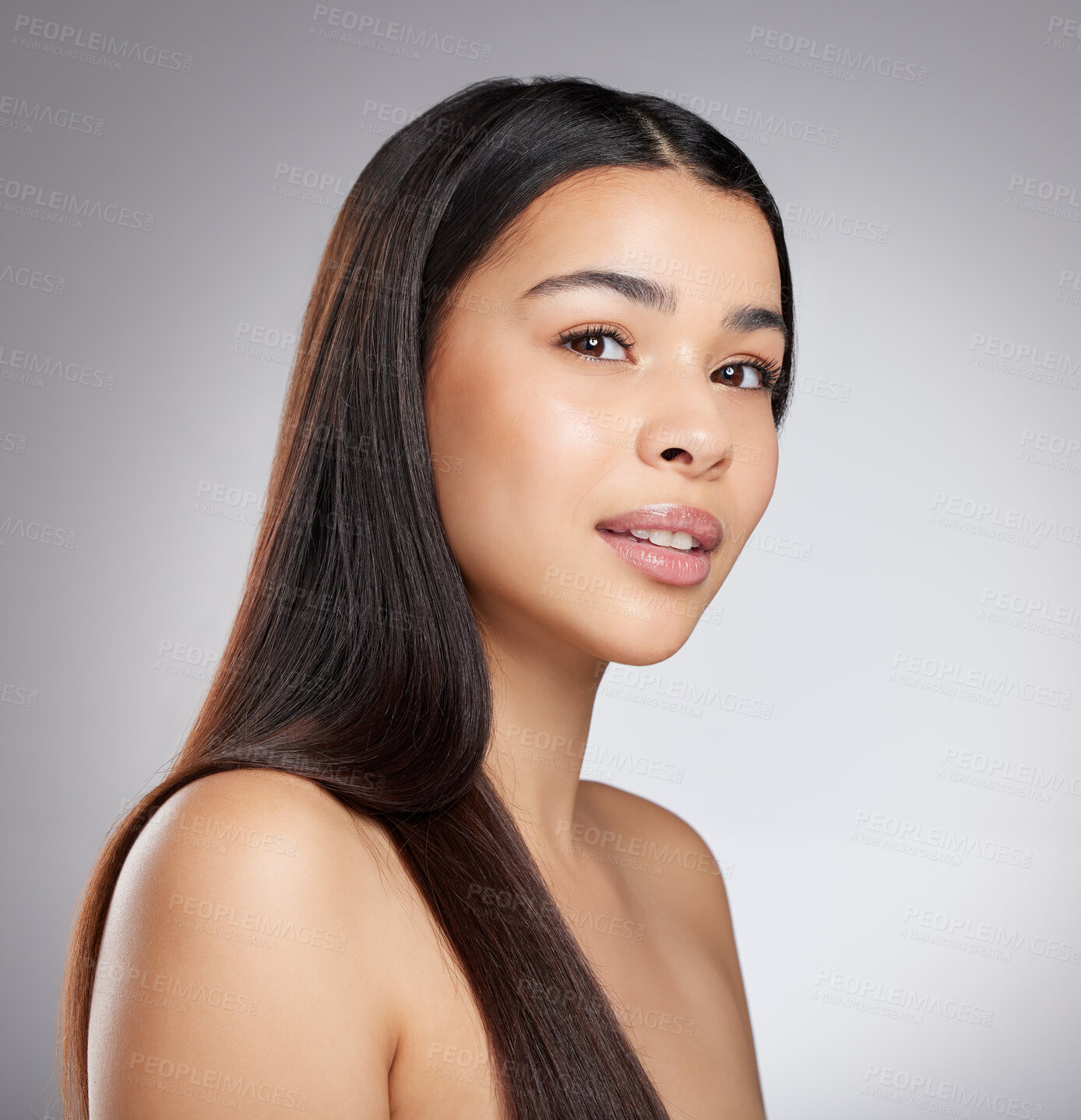 Buy stock photo Hair care, glow or woman with beauty, portrait or style for confidence, results or keratin treatment. Face, shine or girl model in studio on grey background for wellness, natural growth or cosmetics