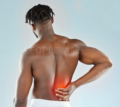 Buy stock photo Fitness, back pain and black man in studio with injury, muscle inflammation or strain on blue background. Red overlay, body and athlete with sprain glow, health problem or exercise accident.