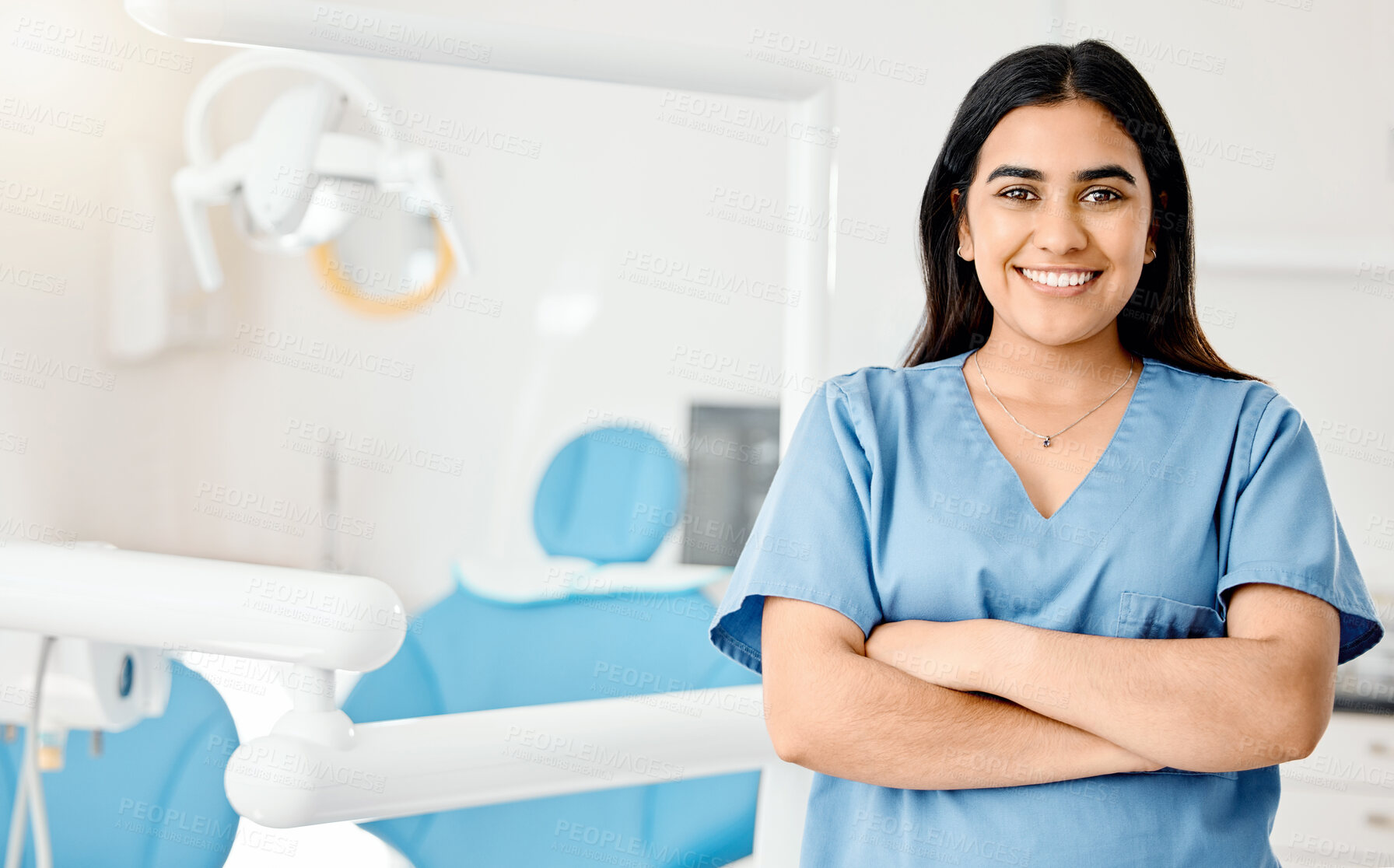 Buy stock photo Shot of a young nurse working in a dentists office