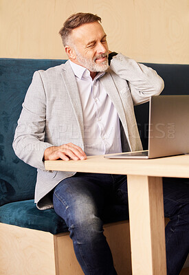 Buy stock photo Cropped shot of a handsome mature businessman looking stressed while working at his desk in the office