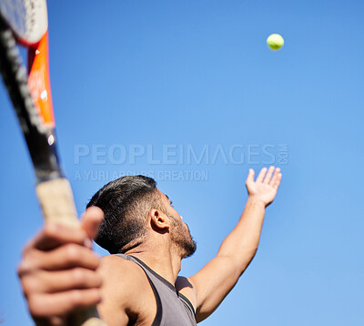 Buy stock photo Throw, sky and man serving tennis ball for fitness training, cardio workout or sports exercise outdoors in summer. Focus, action and low angle of healthy athlete on court to start challenge in game