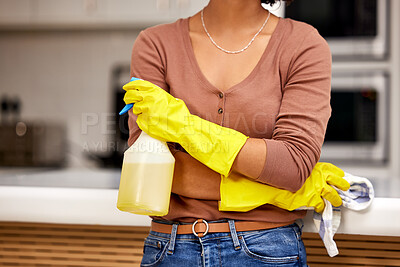 Buy stock photo Female person, spray bottle and cloth in kitchen for cleaning, dirt or bacteria with product. Housekeeping service, woman or cleaner with gloves for safety from chemical, hygiene or sanitize counter