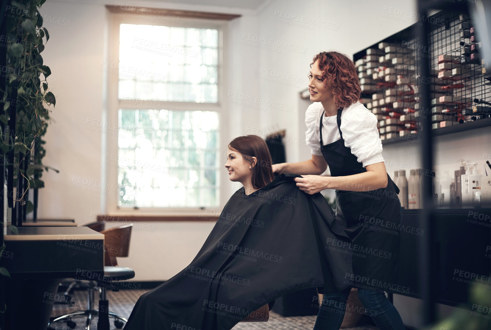 Buy stock photo Woman, hairdresser and business or salon preparation, professional stylist and client in chair. Discussion, treatment and conversation for haircut style, customer and beauty industry for service