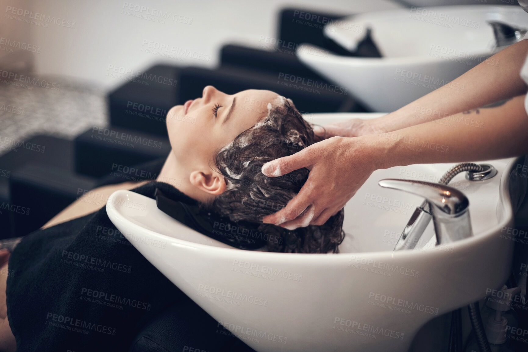 Buy stock photo Hairdresser, wash and soap for client hair, salon and treatment with tap and basin for massage. Hands, scalp clean and balayage hairstyle for happy female person, keratin and shampoo for haircare