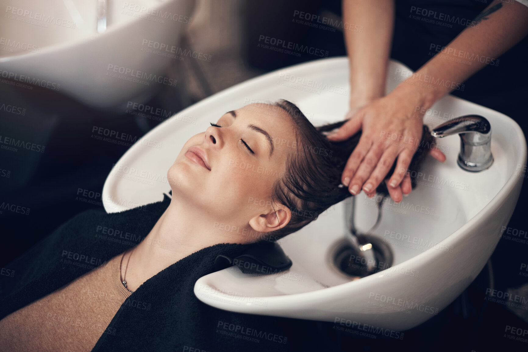 Buy stock photo Woman, salon and basin for washing hair, client and eyes closed or applying treatment with praying hands technique. Professional, hairdresser and haircare with customer, pamper and relaxing service