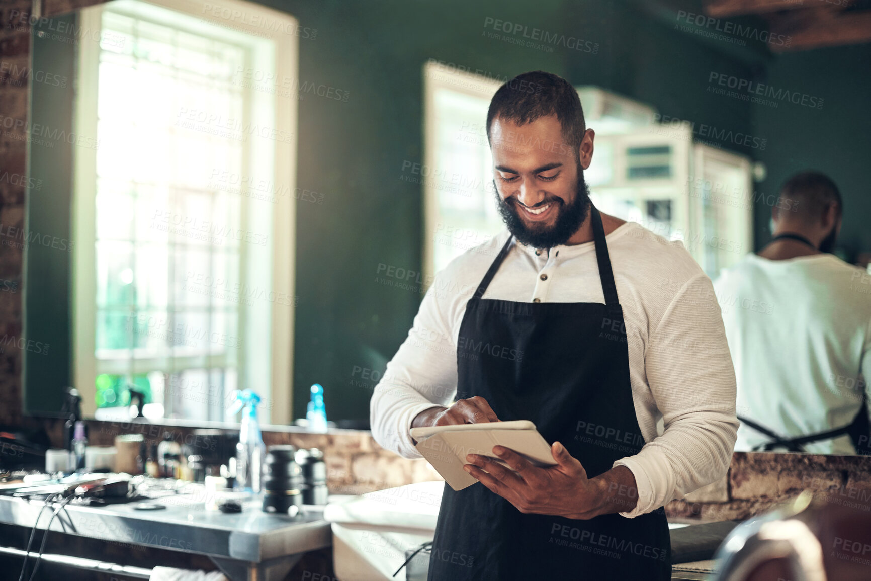 Buy stock photo Business, technology and man with tablet in barbershop for schedule, online appointment or calendar check. Startup salon, owner or digital app for haircare research, styling tips or happy for booking