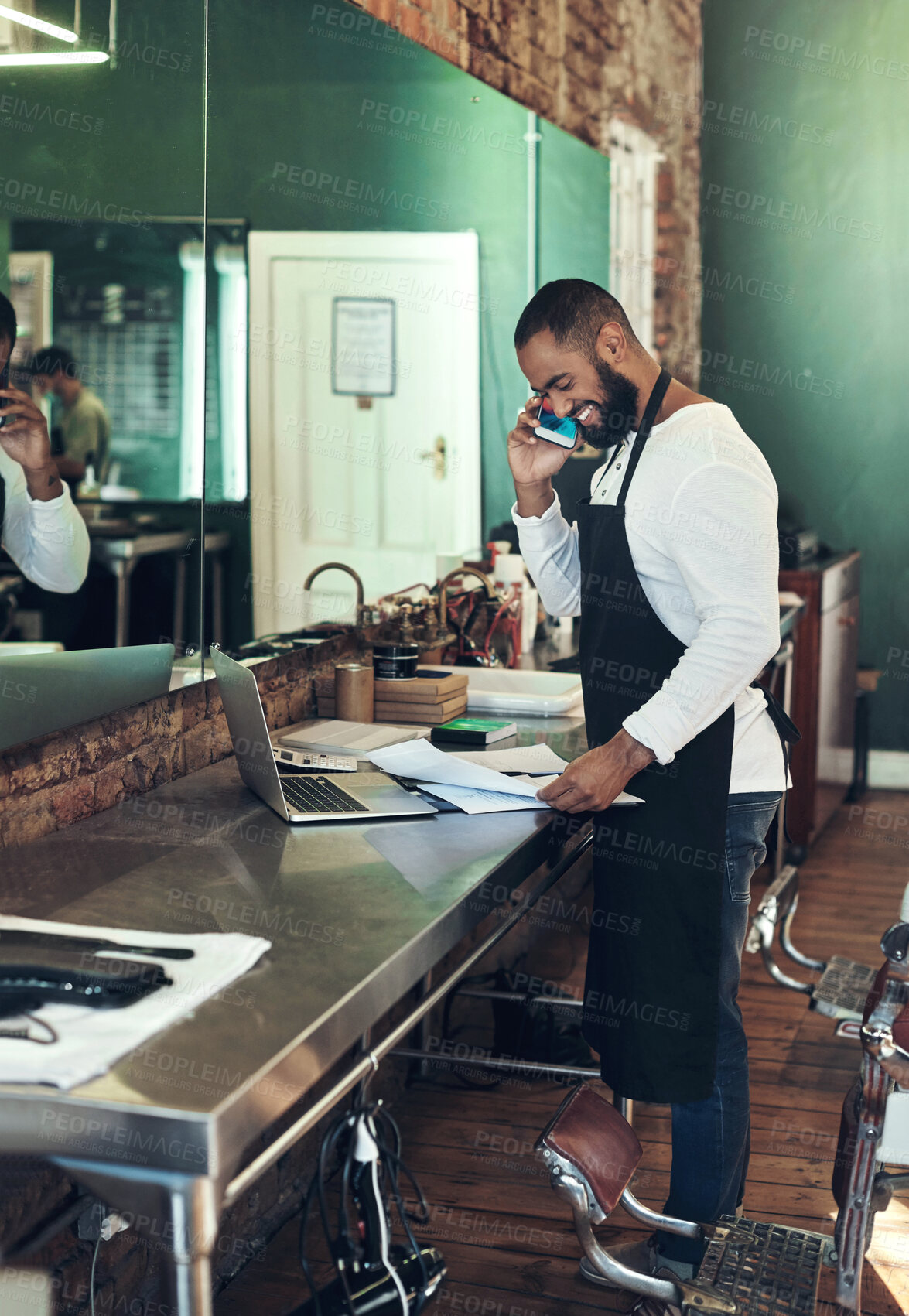 Buy stock photo Smile, document and man with phone call at barber for client booking, discussion or appointment. Small business, stylist and person with tech in salon for availability, consulting or customer support