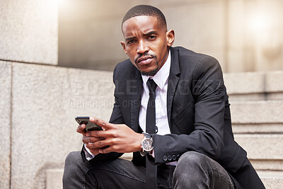 Buy stock photo Businessman, portrait and phone or communication in city for career, sitting and typing or email. Male advocate, mobile and text with web for court case in street, chat with technology for legal