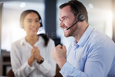 Buy stock photo Celebration, man and woman with headset, yes and success of target, telemarketing and notification on computer. Agency, customer service and male worker with achievement, excited and happy for bonus