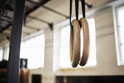 Buy stock photo Still life shot of gymnastic rings in a gym