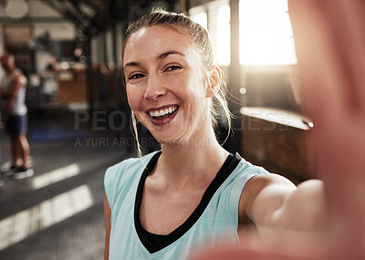 Buy stock photo Shot of a fit young woman at the gym