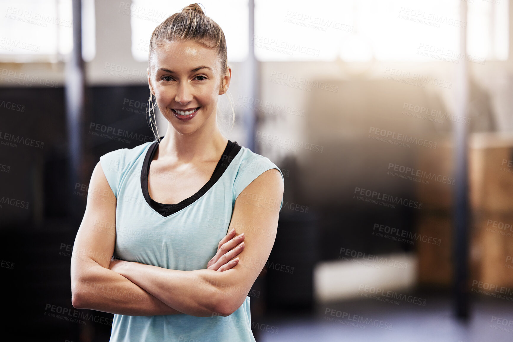 Buy stock photo Shot of a fit young woman at the gym for a workout