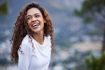 Buy stock photo Cropped shot of an attractive young woman out for an early morning hike in the mountains