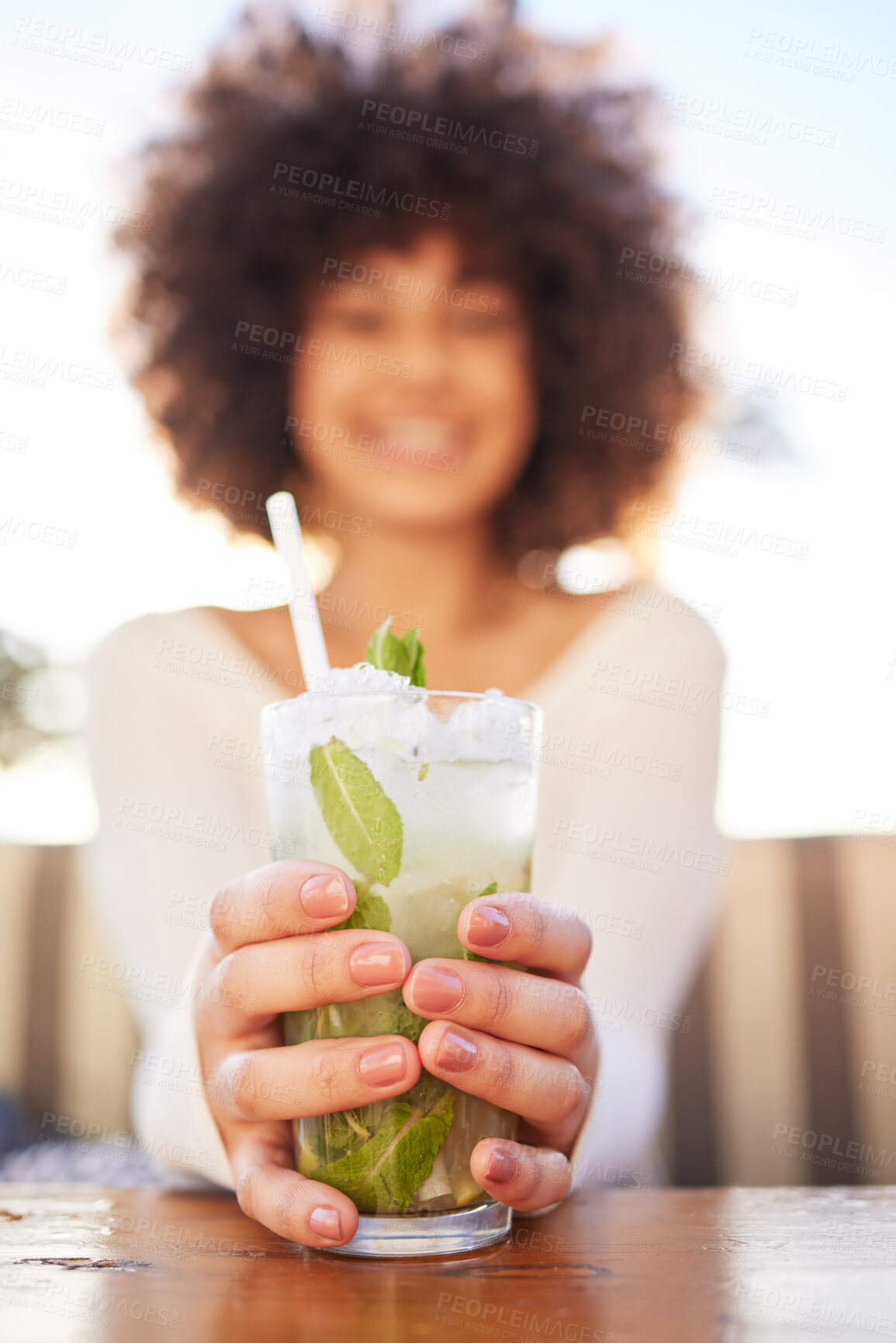 Buy stock photo Cocktail, hands and woman at bar with alcohol, mojito and summer drink for celebration of travel and holiday. Glass, mint and table at a restaurant with black female student with smile and happy