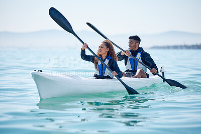 Buy stock photo Kayak, couple and rowing boat on lake, ocean or river for water sports and fitness challenge. Man and woman with a paddle for adventure, exercise or travel in nature with freedom, energy and teamwork