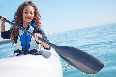 Buy stock photo Portrait of a young woman kayaking at a lake