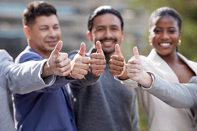 Buy stock photo Portrait of a group of  businesspeople showing a thumbs up outside