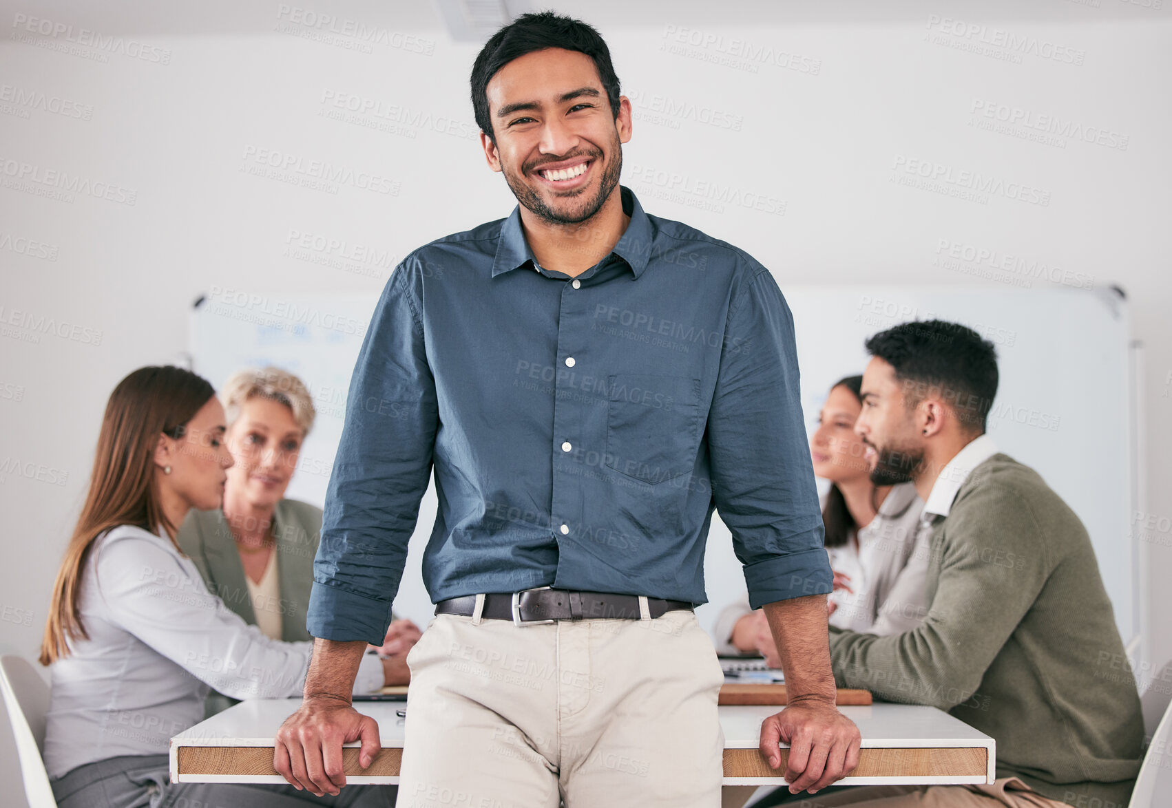 Buy stock photo Shot of a young businessman during a meeting