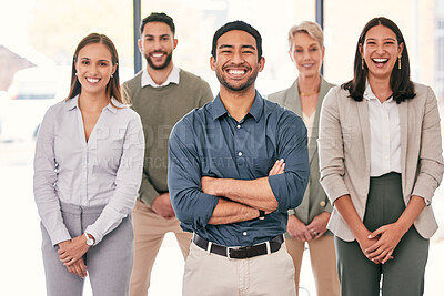 Buy stock photo Shot of a diverse group of businesspeople standing together in the office
