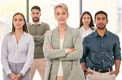 Buy stock photo Shot of a diverse group of businesspeople standing together in the office