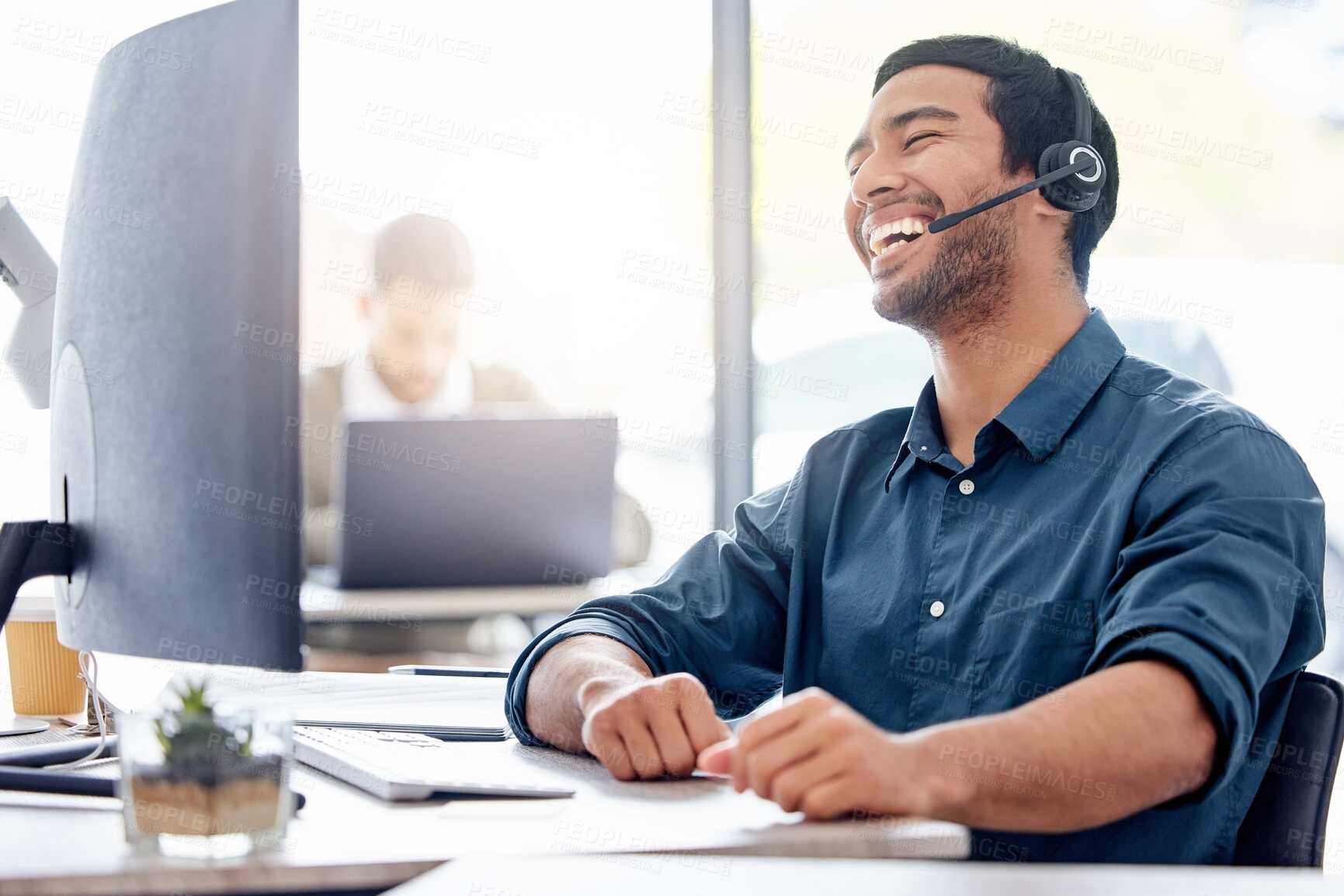 Buy stock photo Man, laugh and computer with headset in office for support, customer with problem in Turkey. Male consultant, keyboard and help with headphones for telemarketing, service for debt review or loan