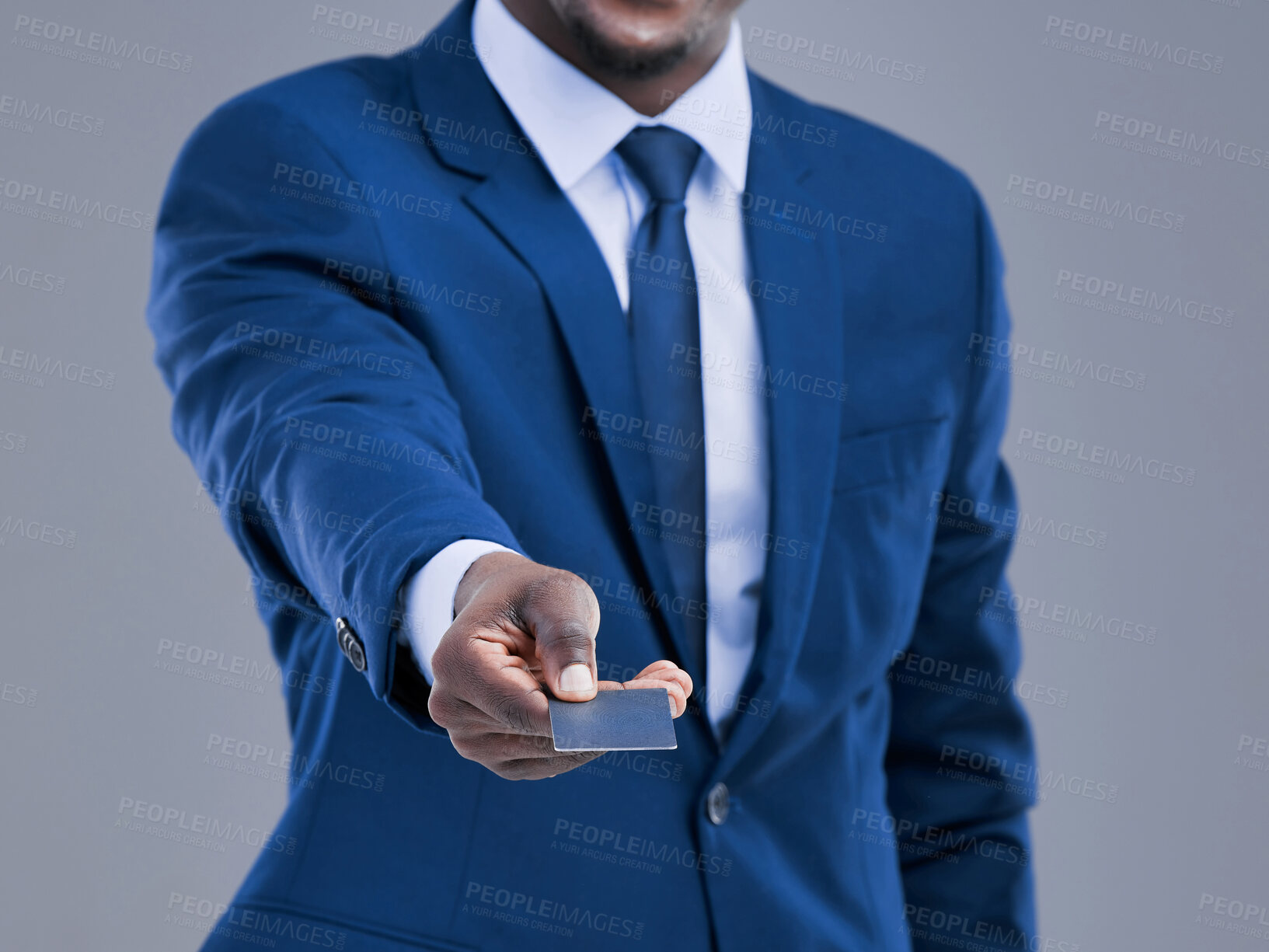 Buy stock photo Business person, credit card and payment in studio for giving, purchase and buying for service. Hand, black man or event planner with debit for expenses, banking detail and finance by gray background