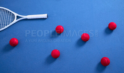 Buy stock photo Racket, floor and tennis balls for game or sport, practice and training for skill development for tournament or match. Blue court or pitch, red equipment and ground for athletic activity and fitness.