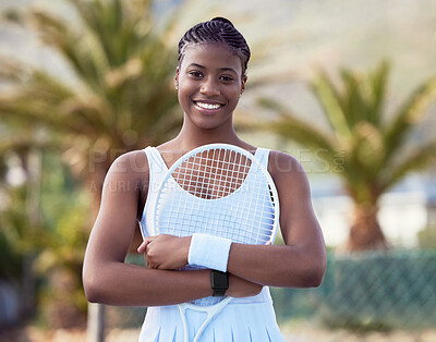 Buy stock photo Shot of a young woman holding  a racket on a tennis court