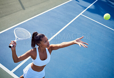 Buy stock photo Woman, racket and tennis ball or aim or playing, fitness and training in summer exercise with equipment. Energy, match and competition challenge, active and practice for sport game or workout
