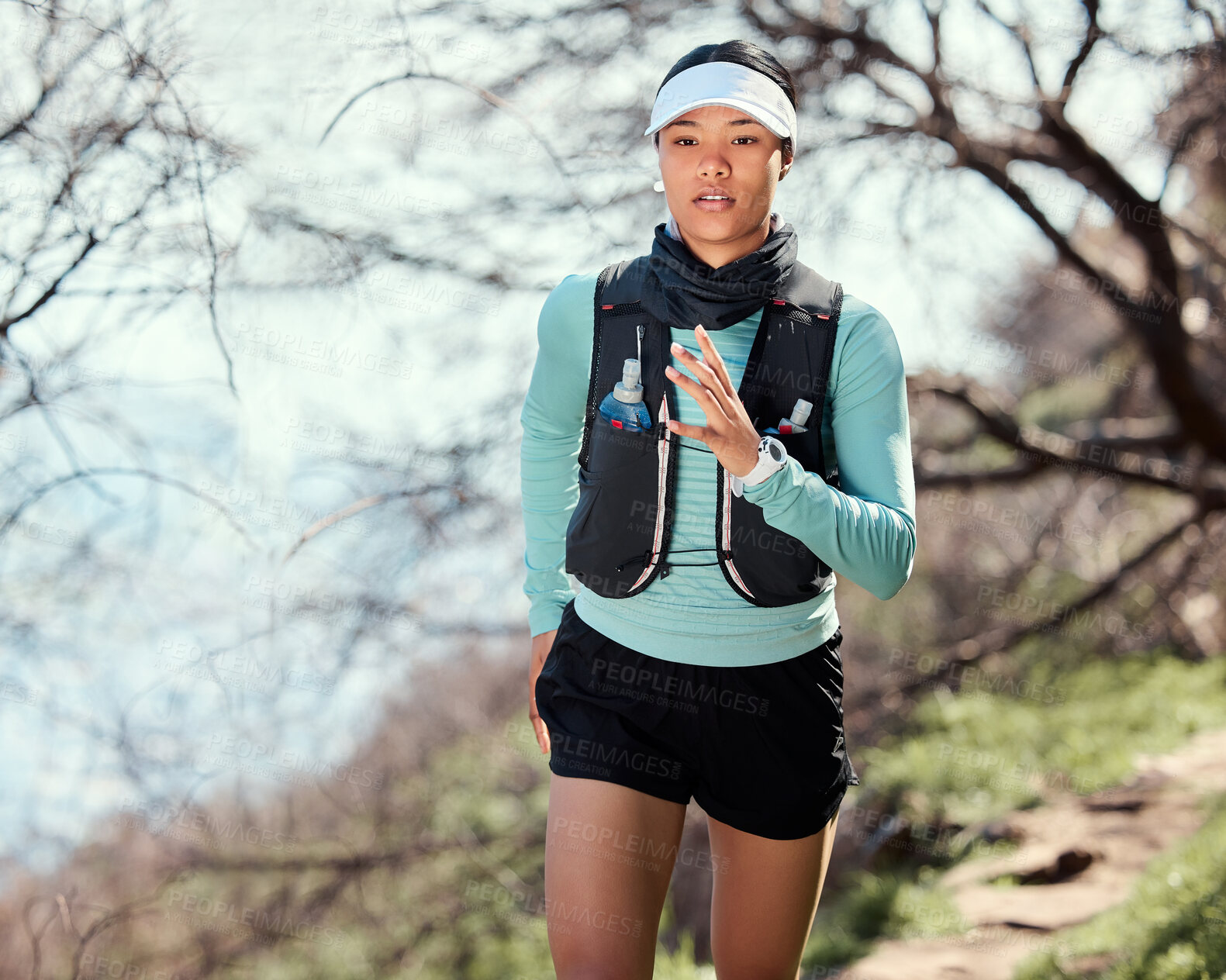 Buy stock photo Woman, running and mountain for outdoor cardio, endurance and marathon to exercise speed. Female person, training practice and nature for action, forest and sports challenge for workout fitness