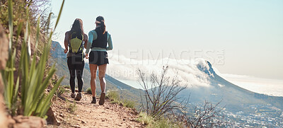 Buy stock photo Hiking, friends and back of women on mountain in morning with backpack on adventure, trekking and walking. Travel, fitness and people outdoors for wellness, health and exercise on holiday or vacation