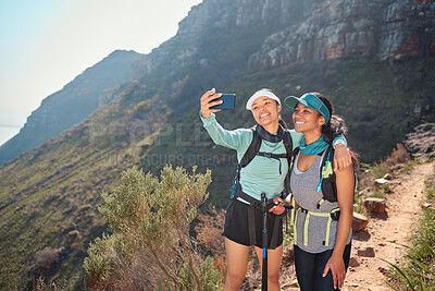 Buy stock photo Hiking, women and friends with selfie in nature for profile picture, social media post and trail progress update. Fitness, backpack team and photography on mountain for bonding, adventure and memory