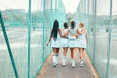 Buy stock photo Full length shot of an unrecognisable group of women walking together after tennis practise
