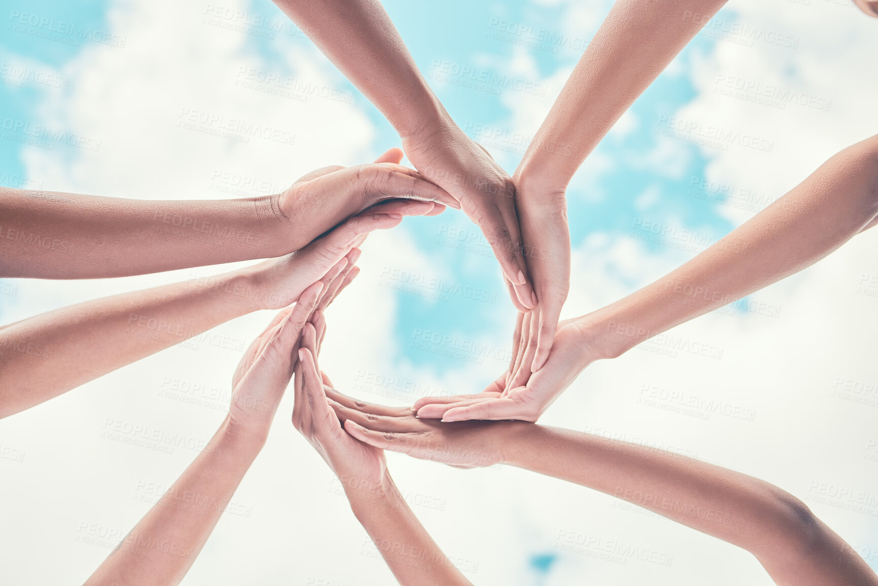 Buy stock photo Team, people and hands with synergy for celebration, motivation and success for competition challenge. Blue sky, players and circle with huddle for achievement, solidarity and support for game