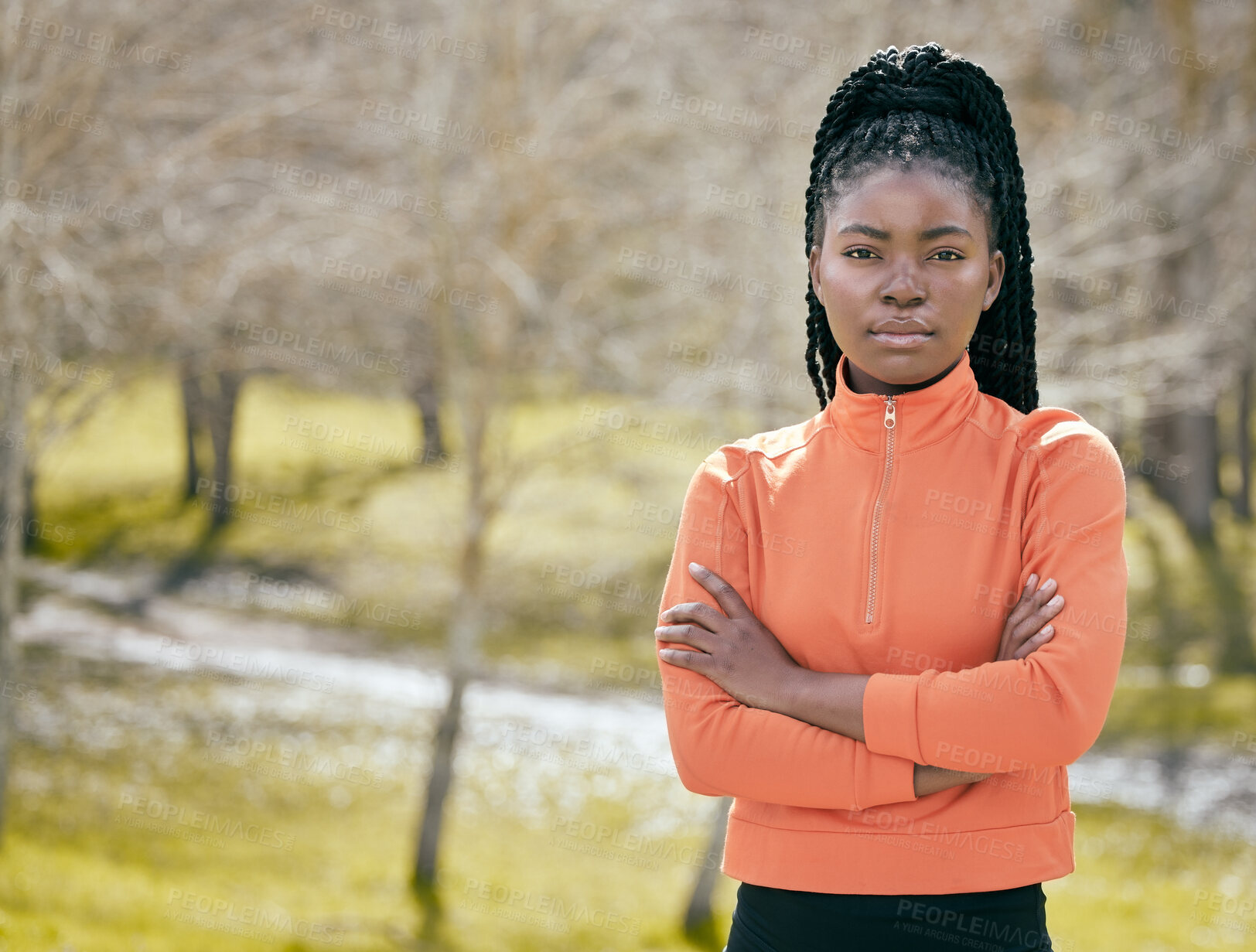 Buy stock photo Black woman, portrait and crossed arms outdoor for fitness, exercise and hiking with smile in nature. Female person, face and confident for workout, health and training with serious determination