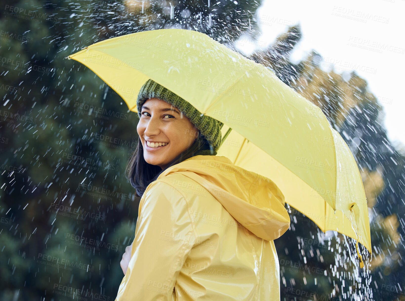 Buy stock photo Umbrella, rain and woman with smile, portrait and carefree in weather of Seattle, travel and explore in vacation. Park, water and girl in raincoat, outdoor and happy in winter, holiday and Washington