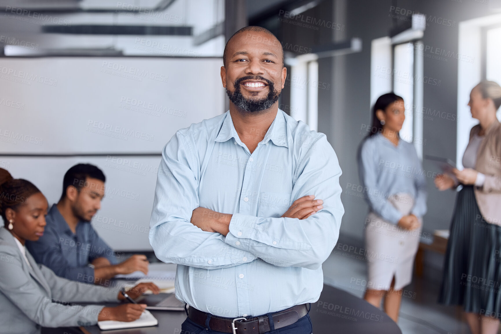 Buy stock photo Portrait, leader and business man with arms crossed in team meeting for coworking, pride or career. Face, manager and confident professional entrepreneur, employee or happy financial broker in office