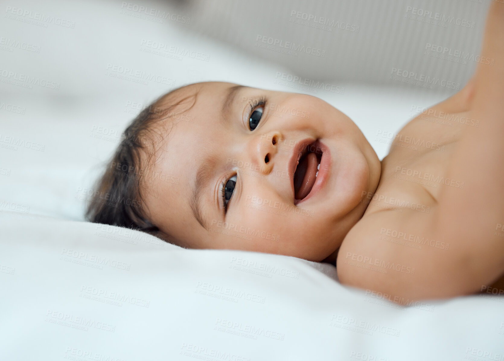 Buy stock photo Baby, portrait and smile on bed in home for child care, wellness and relax with peace, calm and health. Newborn, face and young girl in bedroom of house in morning for growth, development and happy