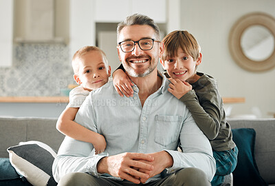 Buy stock photo Dad, kids and hug in home portrait, peace and single parent love for boys in living room. Father, children and embrace for security on couch for care in childhood, relationship and comfortable joy