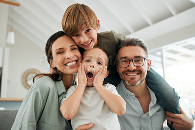 Buy stock photo Family portrait, kids and hug in home for happiness, playful and connection for bonding on sofa. Parents, children and embrace for security on couch for care in childhood, relationship and smile