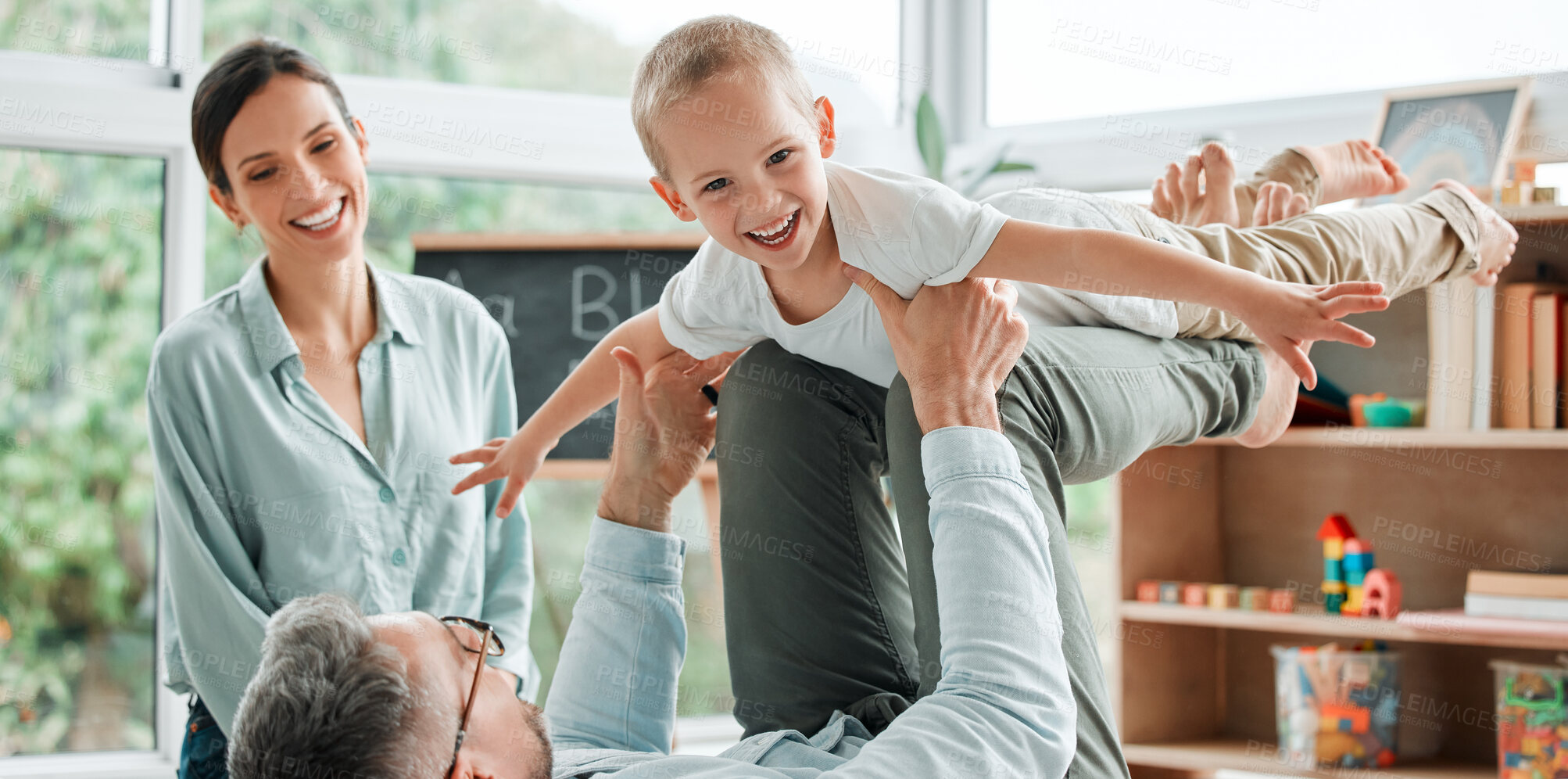 Buy stock photo Airplane, portrait and parents with son, game and happiness with weekend break, playful and smile. Home, face and family with boy, childhood and cheerful with joy, fantasy and time together in lounge